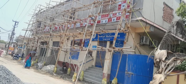 Building facade renovation with bamboo scaffolding