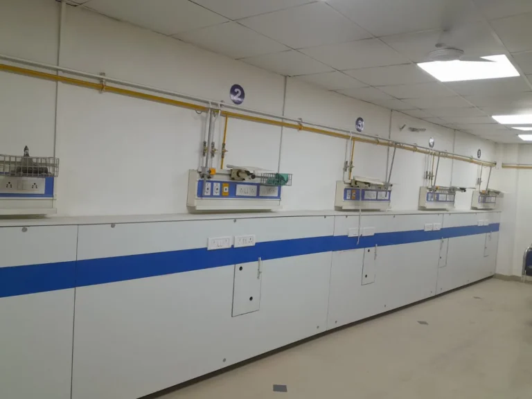 Medical gas pipeline and bed-head units along a hospital wall